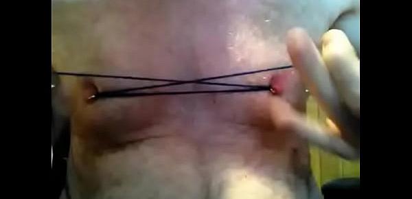 Nipple play with hooks and screws